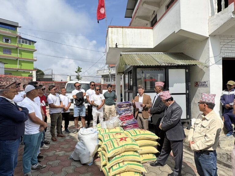 mayor of suryodaya muncipality with the chief adminstrative officer and deputy mayor in relief distribution campaign following the landslides after 19th ashoj rainfall