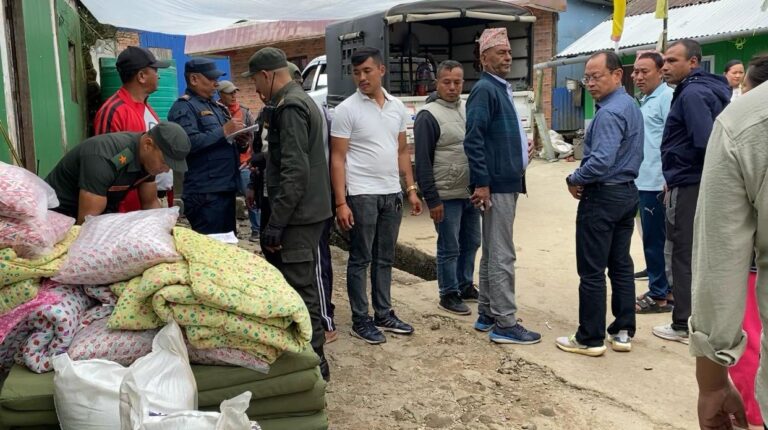 mayor of suryodaya municipality with deputy mayor along with other concerned officials in the relief distribution following the calamities caused by inesseant rainfall in ashoj 18 and 19